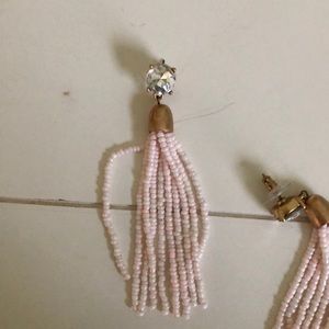 Light pink dangle earrings